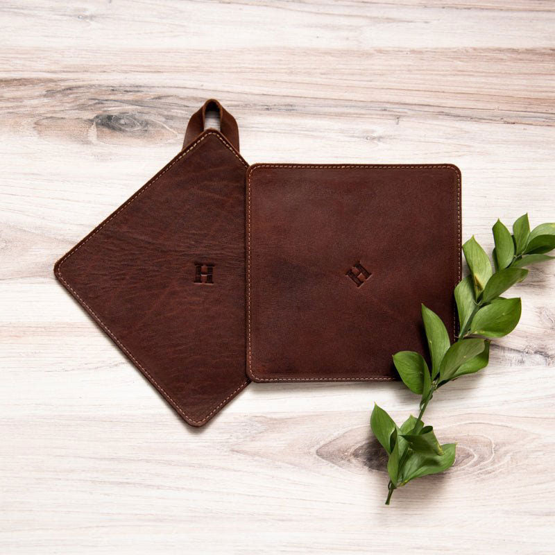 Leather trivet in rich brown, American made, perfect for protecting surfaces from hot pots.