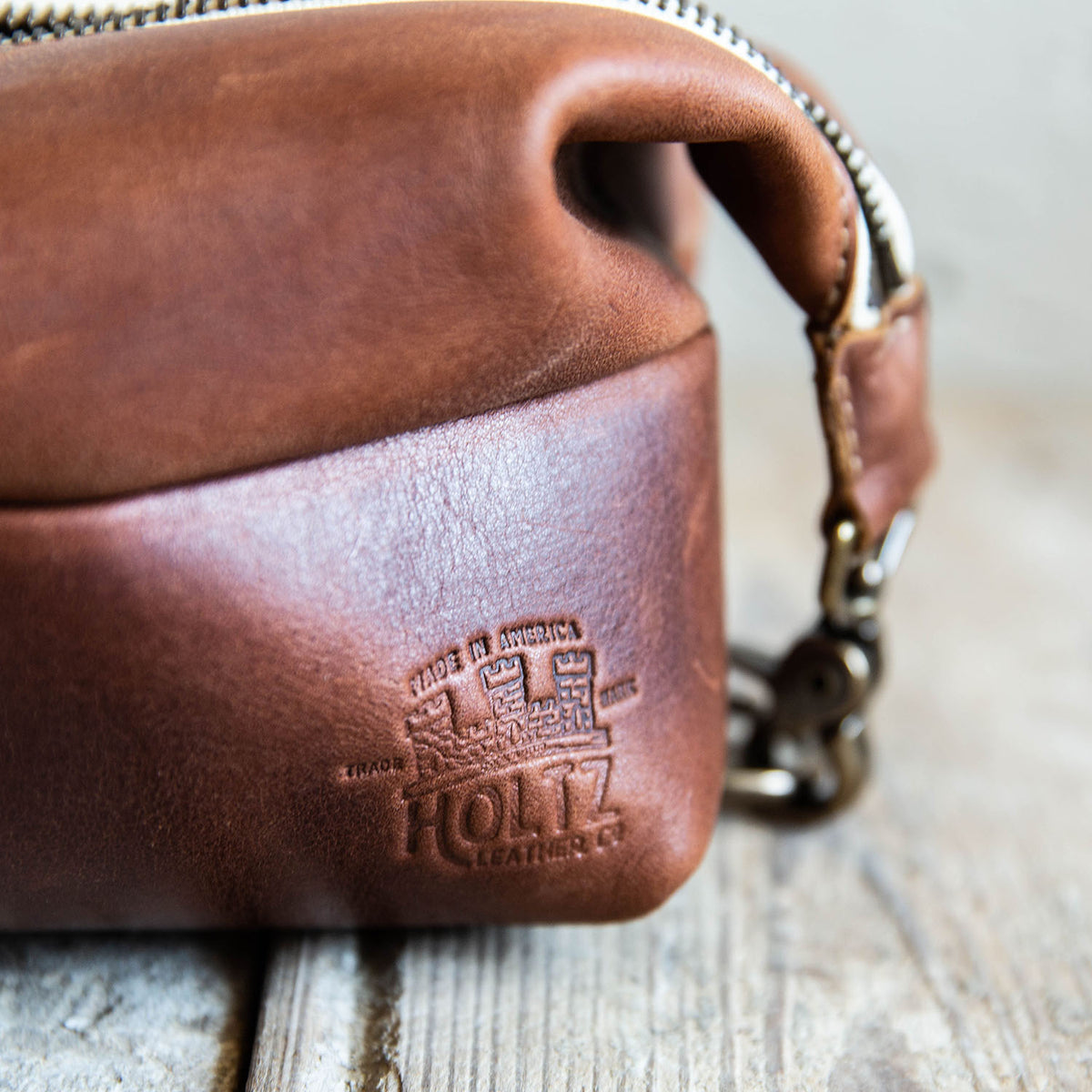 Dopp Bag - Personalized brown fine leather toiletry bag with zipper, ideal for travel and grooming essentials.