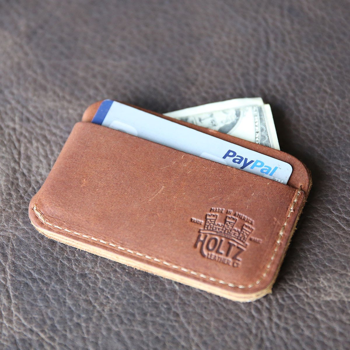Crimson Tide Charleston personalized fine leather triple sleeve front pocket wallet in brown.