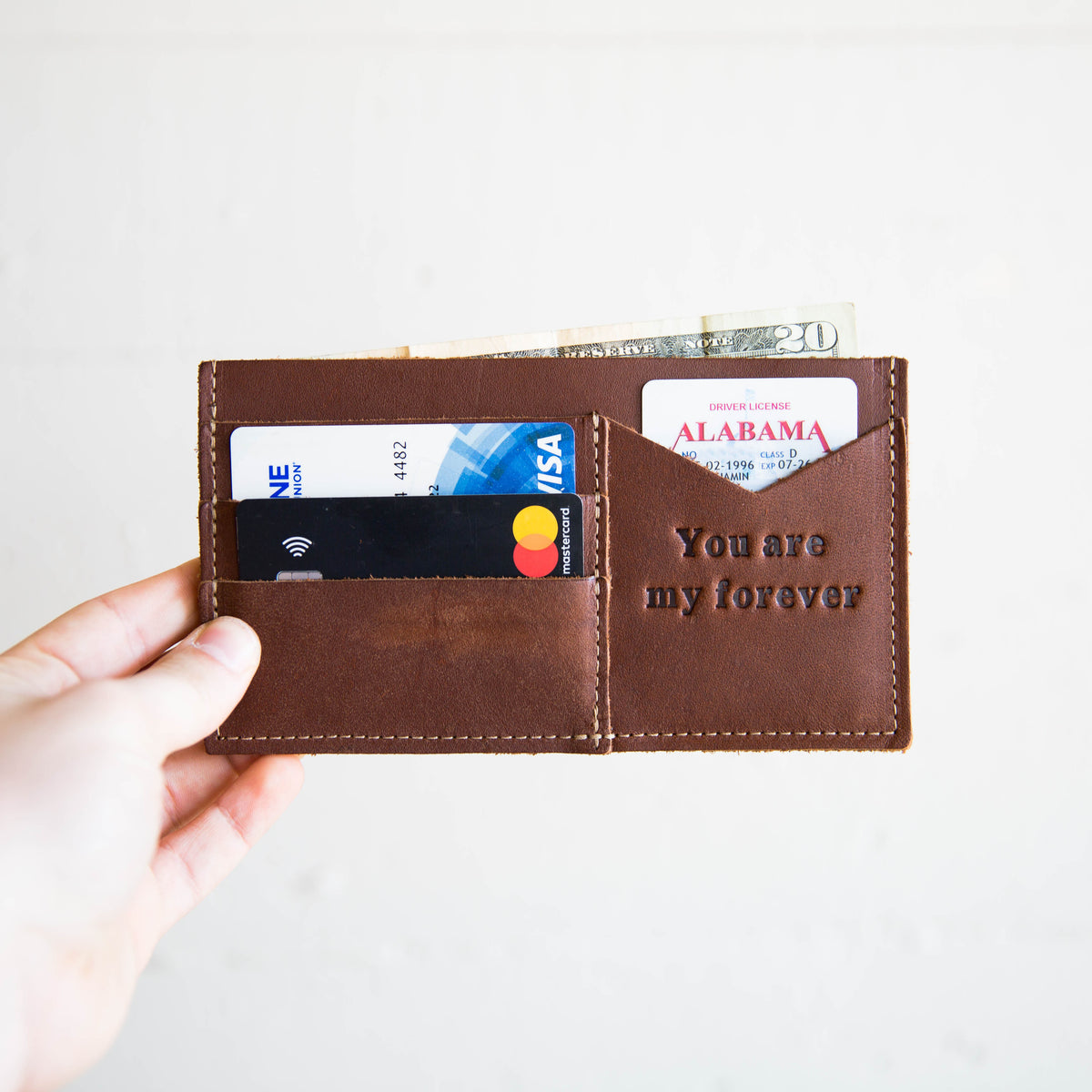 Betty Jean Women’s Fine Leather Envelope Clutch Wallet in brown with card slots and a message.
